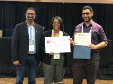 Rebecca Royster (center) and Nordine Sebkhi (right) are pictured with Nitin Rai, chairman of the board of trustees with TiE Global, at the TiE Young Entrepreneurs (TYE) University Global Pitchfest Competition.&nbsp;